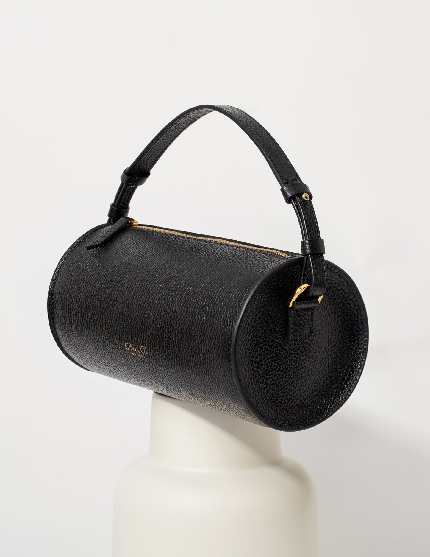 CNicol Black Leather Evie Bag on White Base