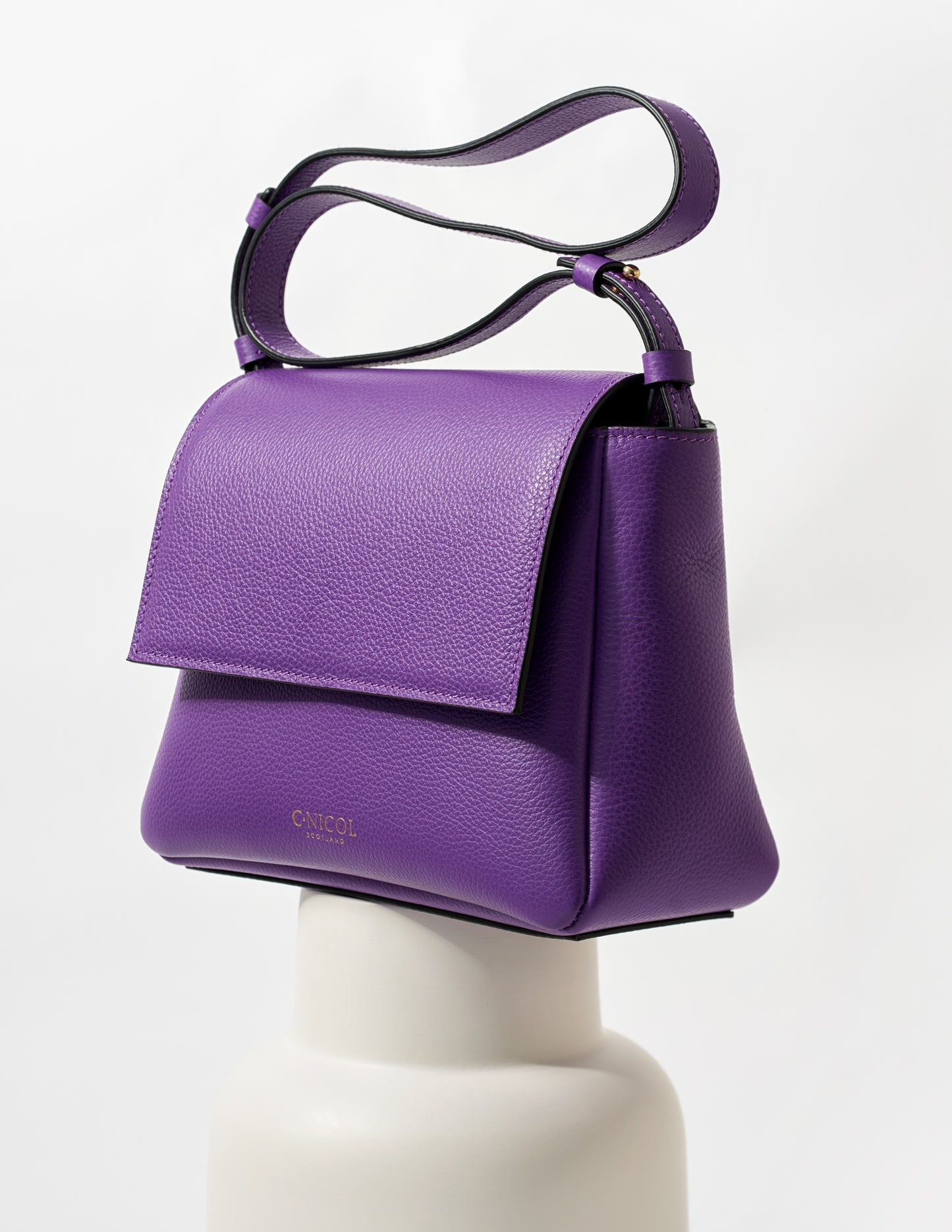 CNicol Purple Leather Fia Bag on White Base