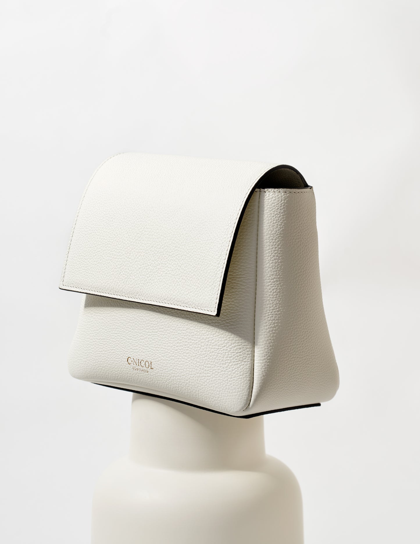 CNicol White Leather Fia Bag on White Base