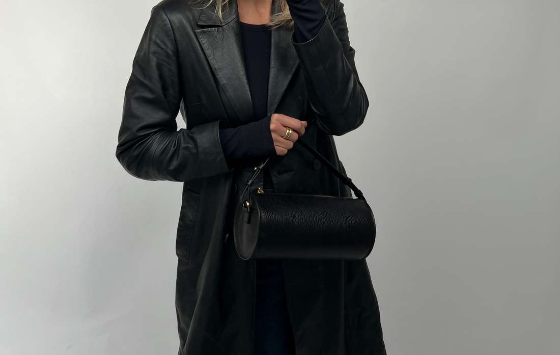 Hanneke Tsujimaru wears the Evie bag in black.