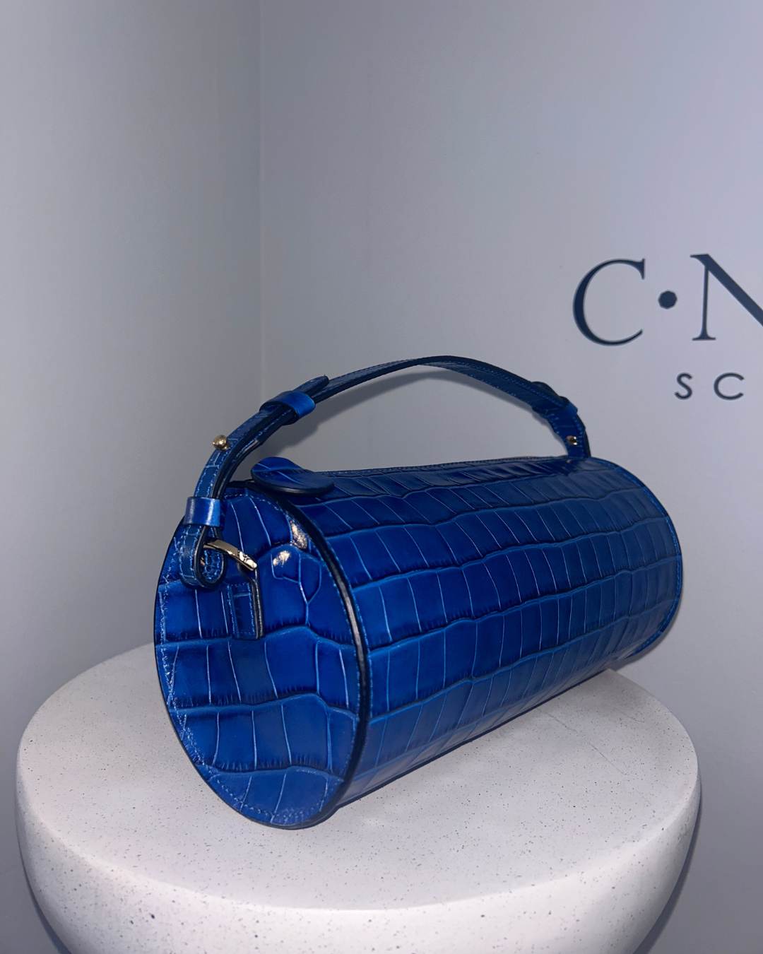 CNicol Blue Croc Leather Evie Bag Side on White Base