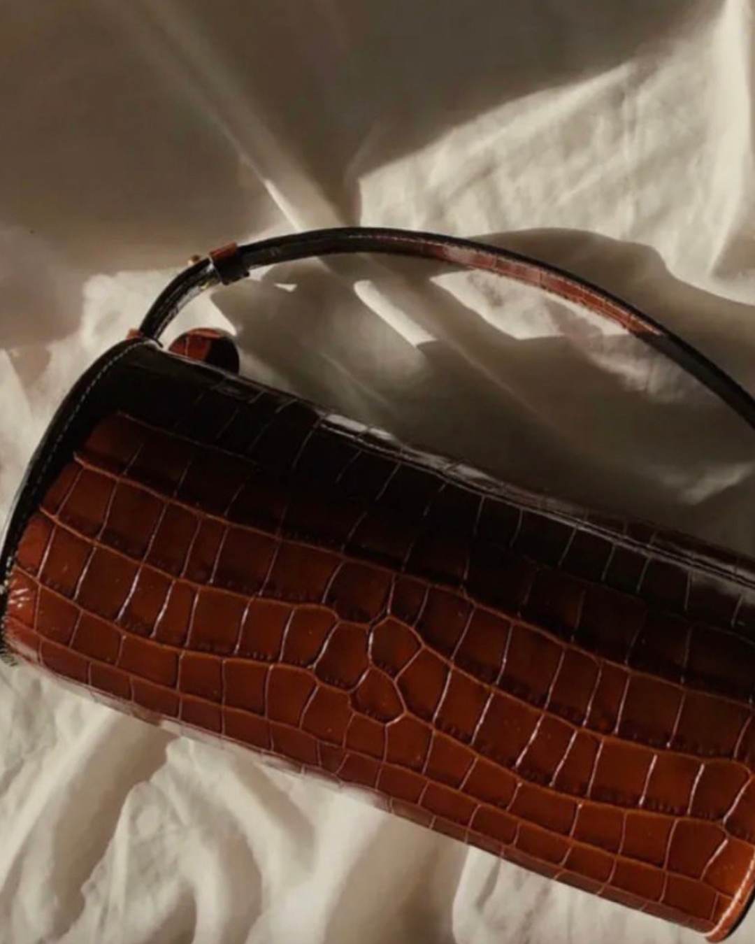 CNicol Brown Leather Evie Bag Top View on Crushed White Fabric
