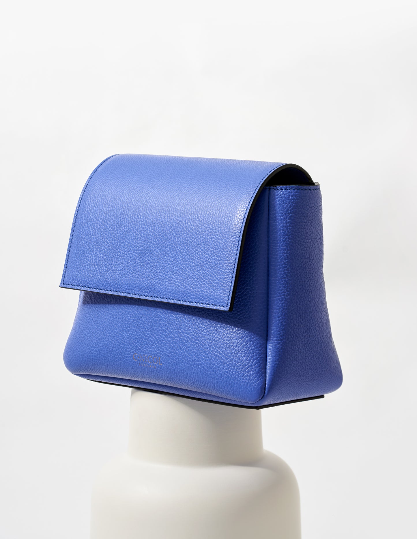 CNicol Blue Leather Fia Bag on White Base