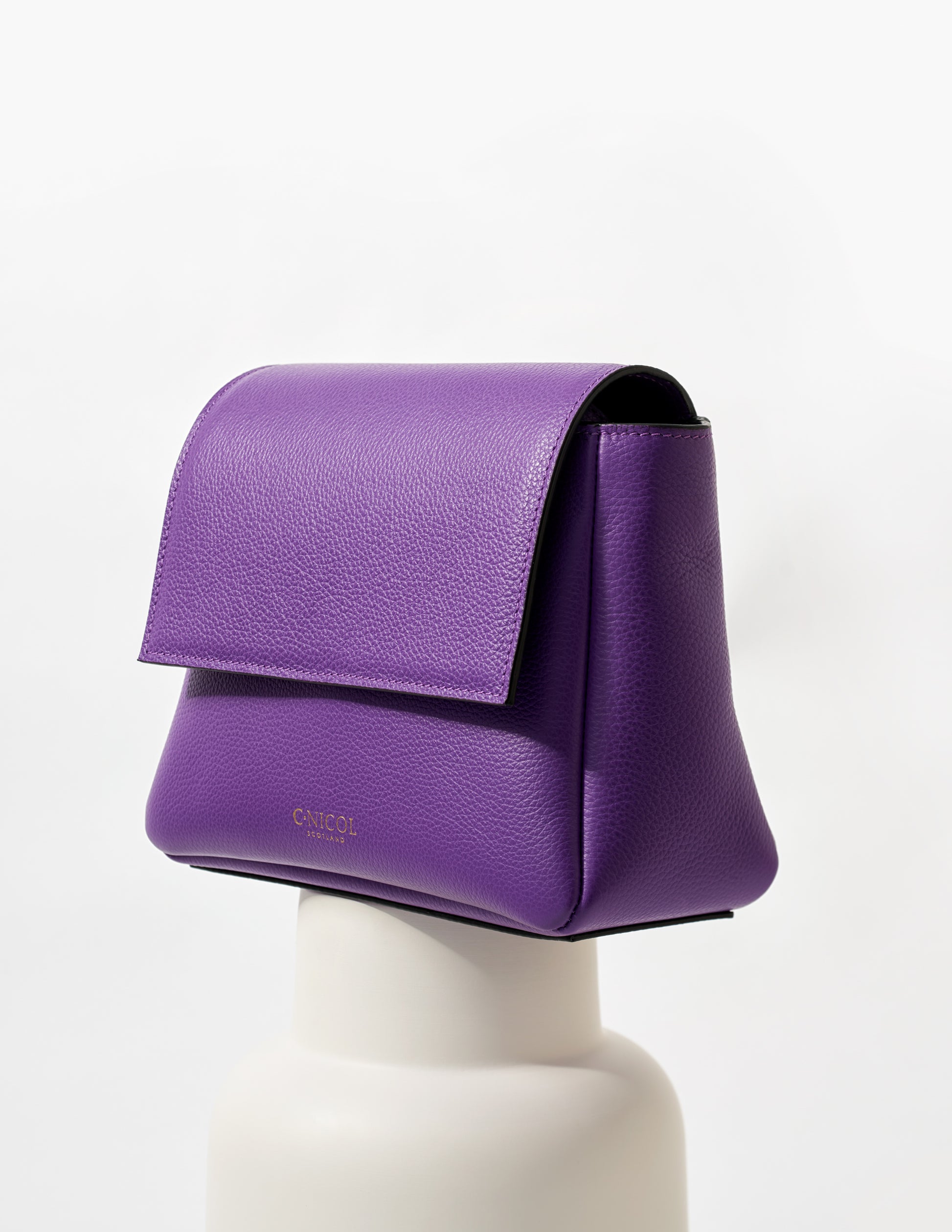 CNicol Purple Leather Fia Bag on White Base
