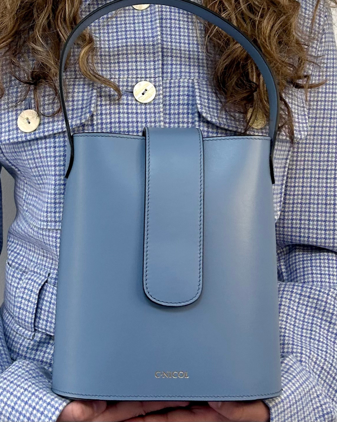CNicol Blue Leather Holly Bag held by Model 