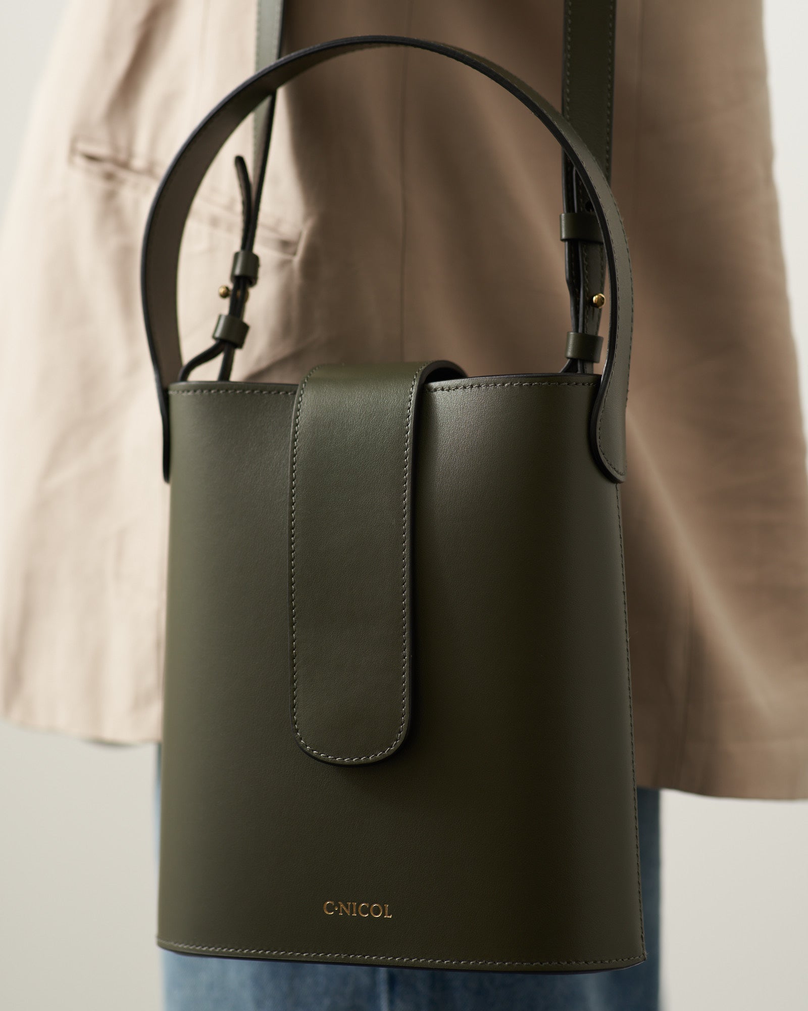 CNicol Green Leather Holly Mini Bag Against Models Brown Coat